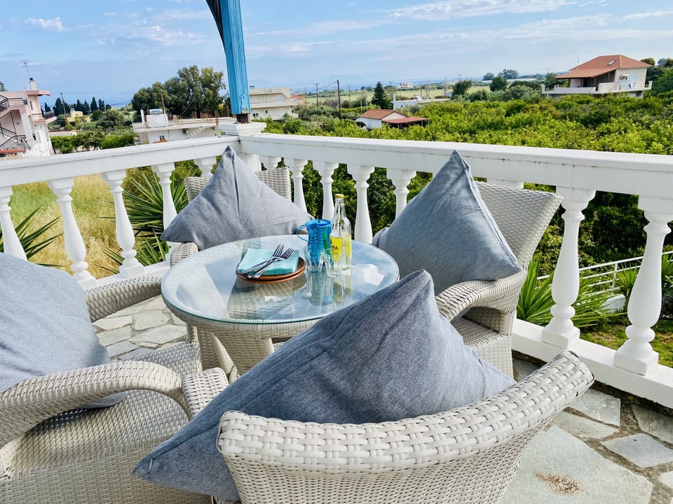 Enjoy your morning coffee or evening wine overlooking the sea and mountains.