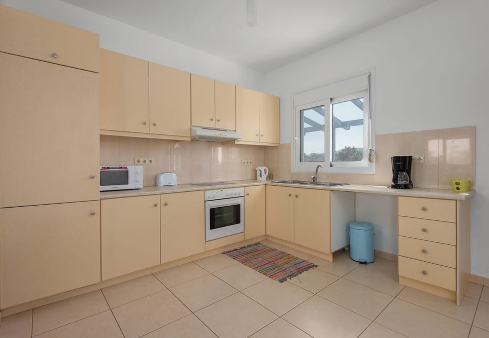 Fully equipped kitchen, with views out over the village.