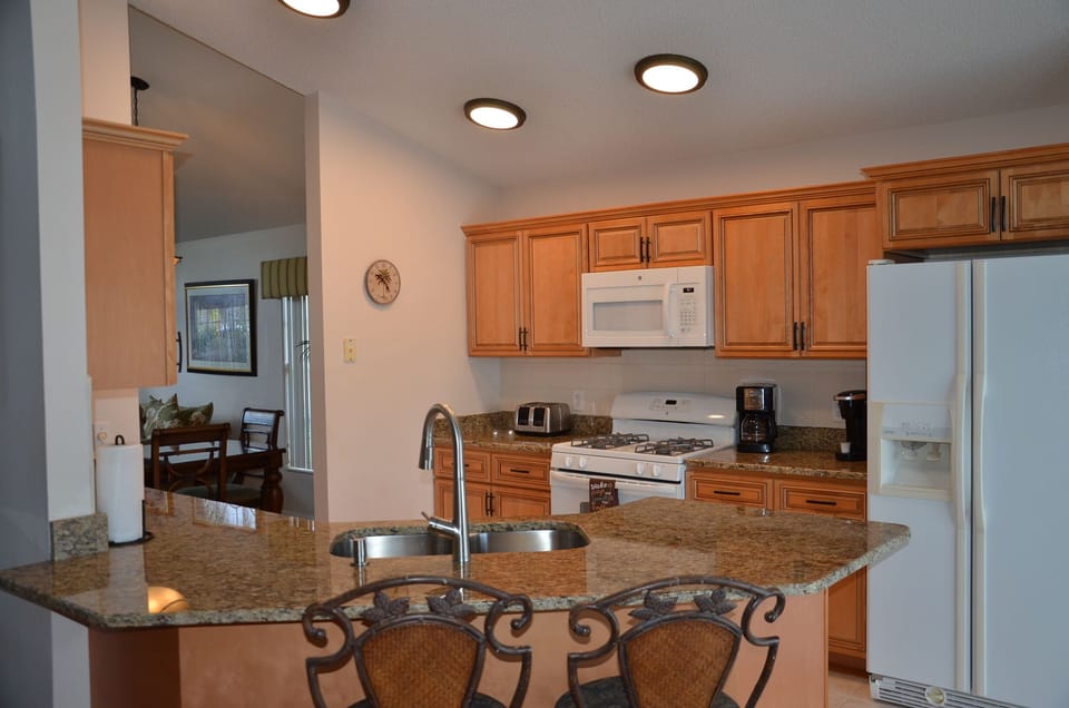 Updated Kitchen with new cabinets and granite counter tops September 2019