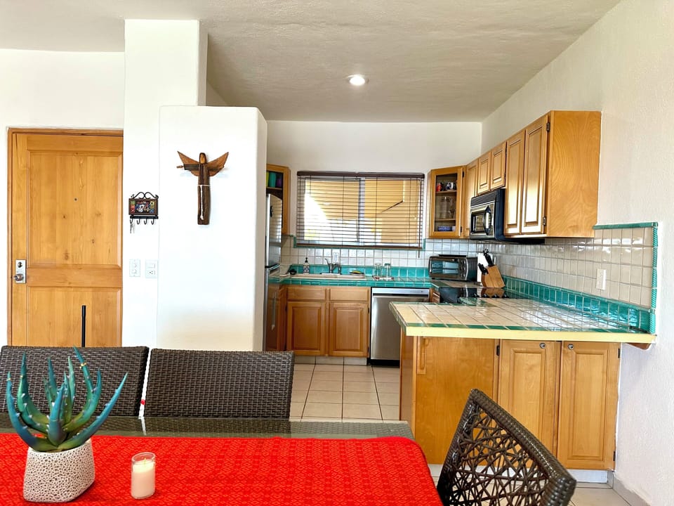 Kitchen, dining and main entrance