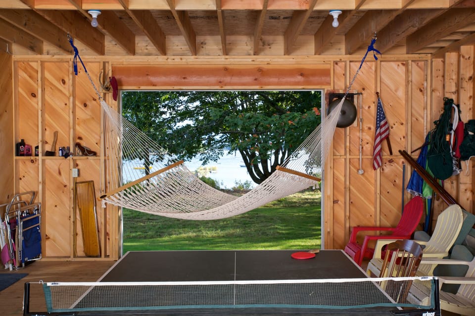 Boat shed with hammock and pingpong table