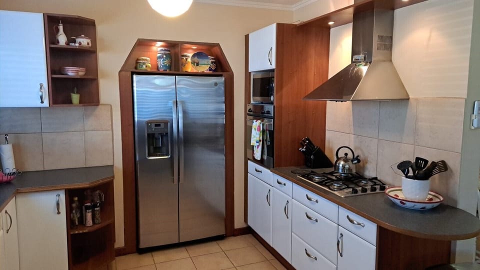Kitchen with stove, oven and microwave