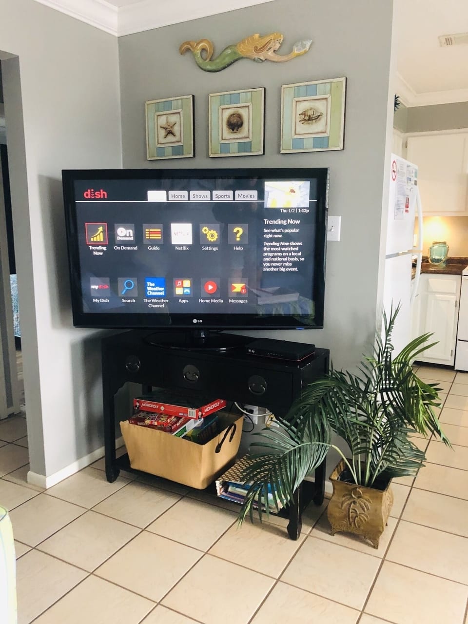 Living area has 55" flatscreen TV w/DISH Network.