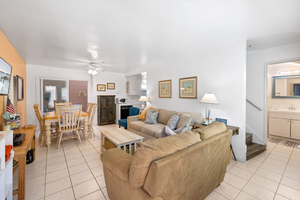 The living room and dining area have an open layout that fits your whole group