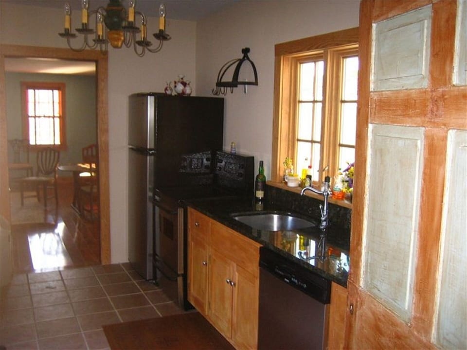 Fully updated kitchen adjacent Outdoor Patio, Family Room and Dining Room