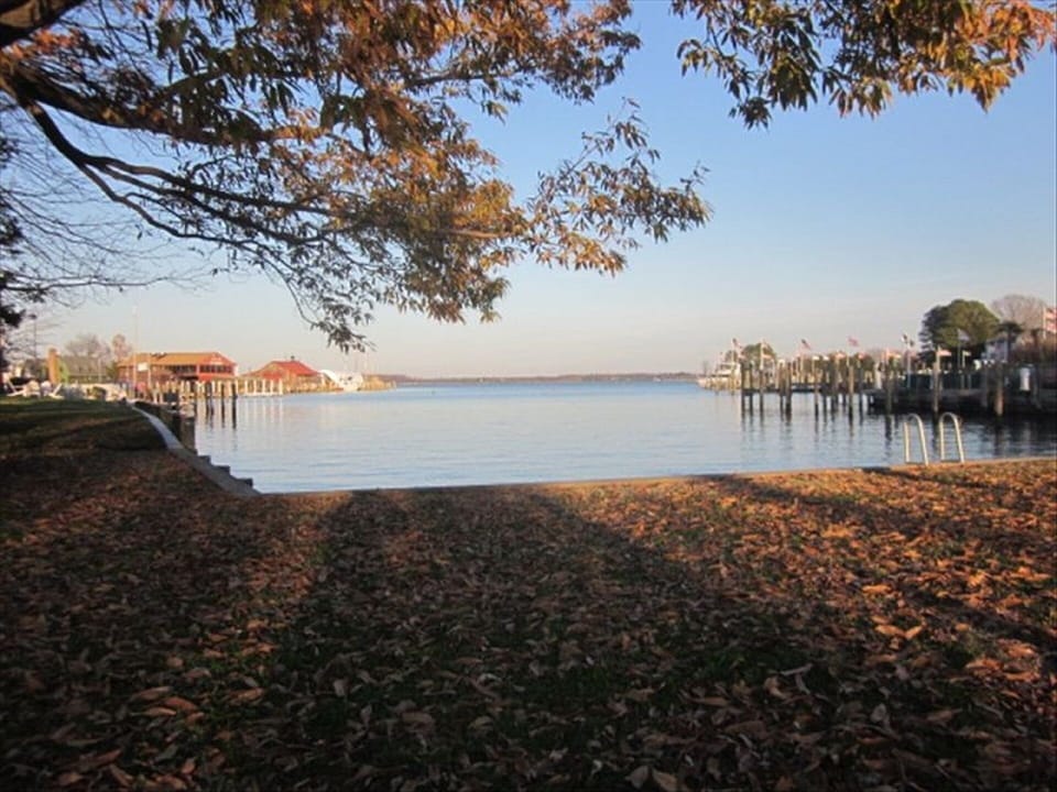 Park and beautiful St. Michaels harbor in late afternoon