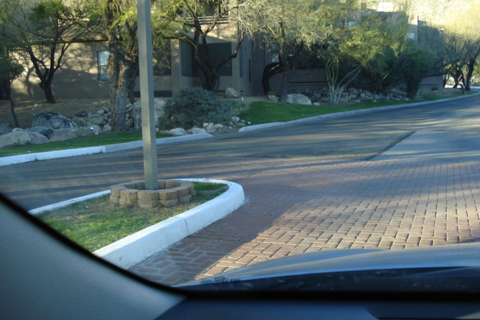 Street entering condo complex
