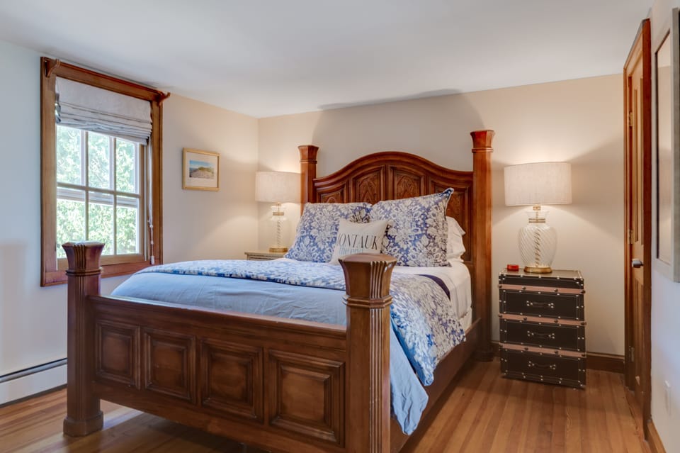 First floor master suite with cozy living room, fire place, pullout sofa, bath
