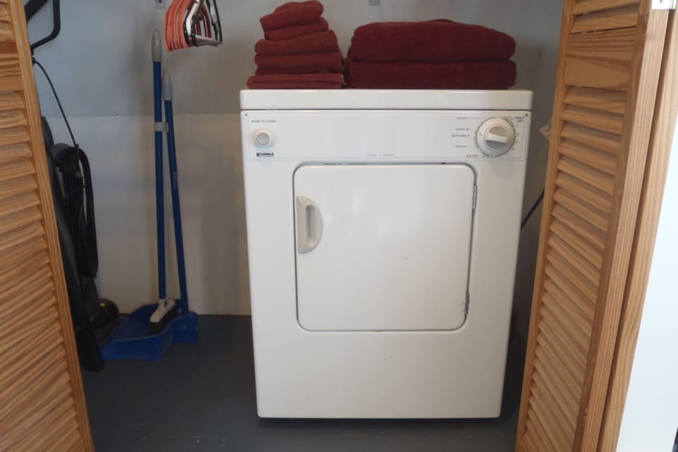 A compact dryer to fluff up & dry towels on damp or cloudy days.