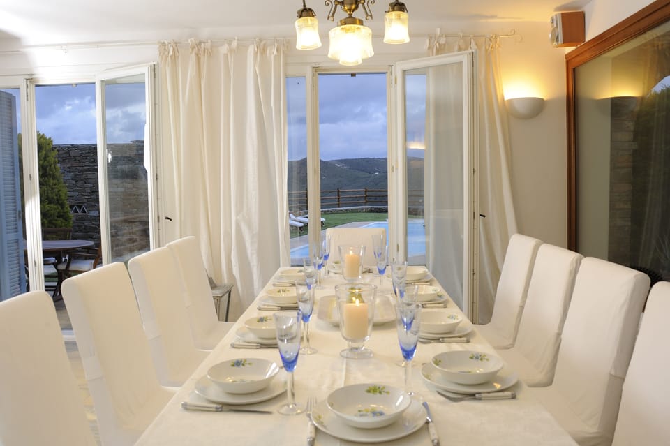 Dinner celebrations at the pool level of our luxury villa in Andros