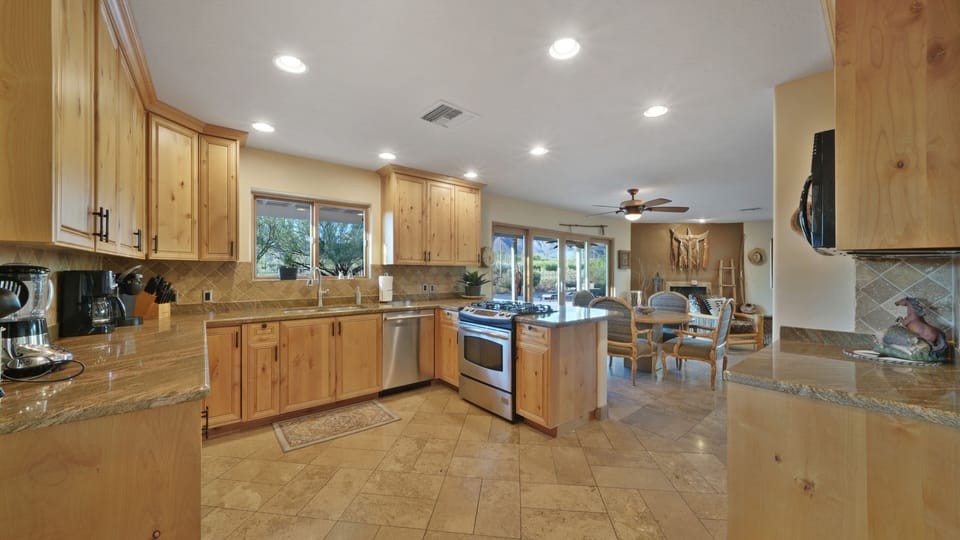 Appointed  with Granite, Stainless Steel Gas Cooking & Alderwood Cabinets.