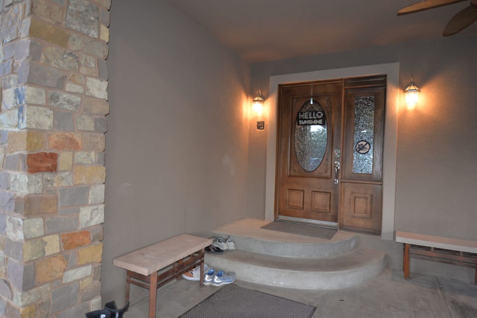 Front entry door with electronic digital lock. Two stairs up front entry porch.
