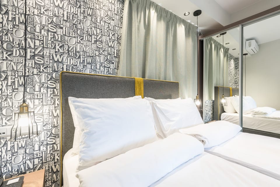 Superior Room, Courtyard View | 1 bedroom, in-room safe, individually decorated, individually furnished