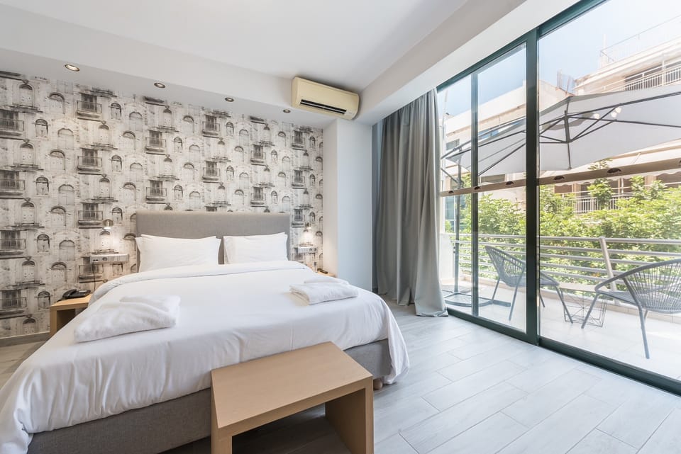 Superior Room, Balcony, City View | 1 bedroom, in-room safe, individually decorated, individually furnished