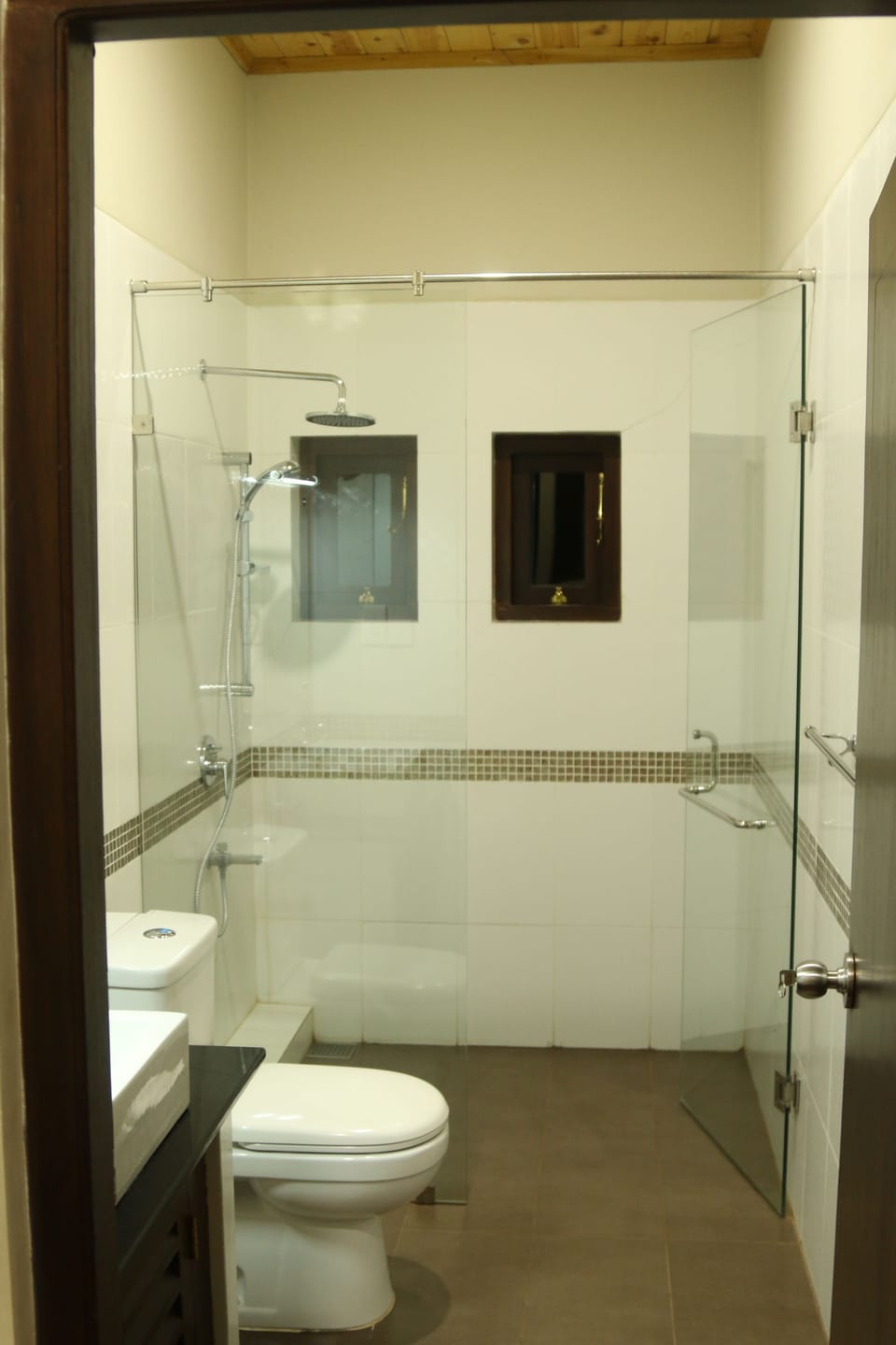 Shower, free toiletries, hair dryer, slippers