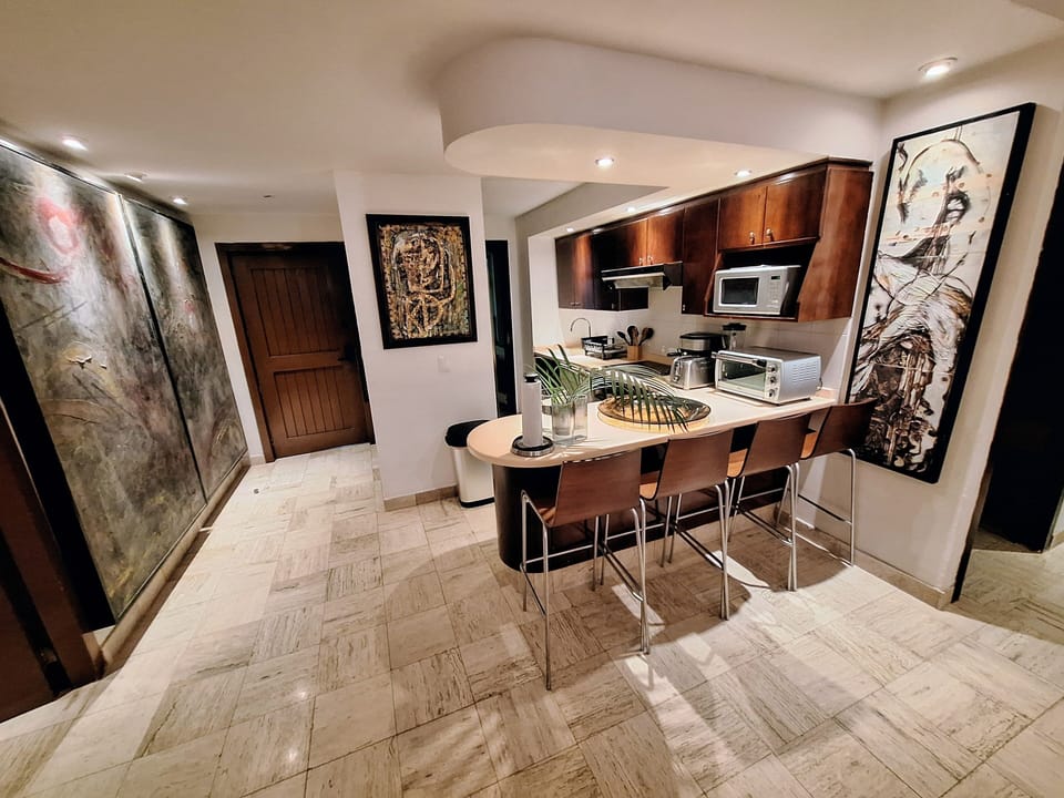 kitchen with 4 high chairs / stools