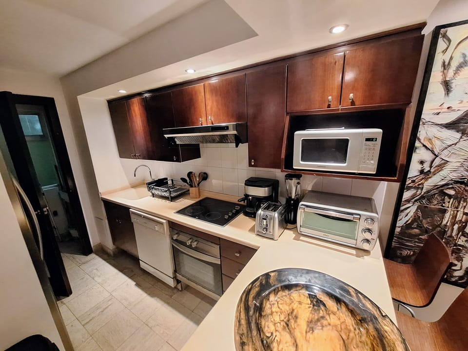 kitchen, dish washer, micro and toaster oven, coffee maker, blender