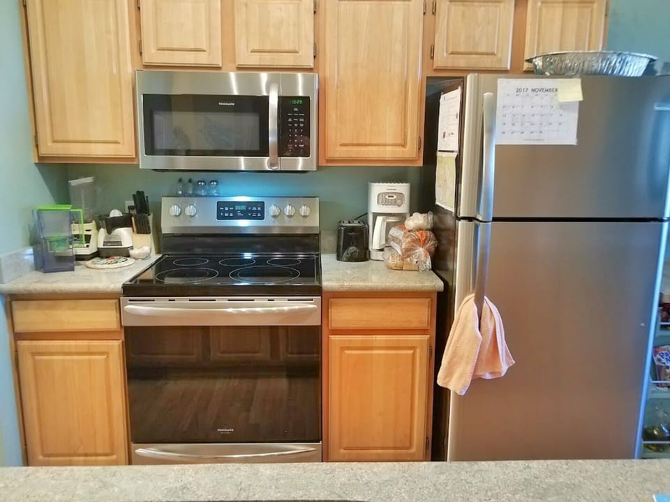 New stainless steel appliances in kitchen 