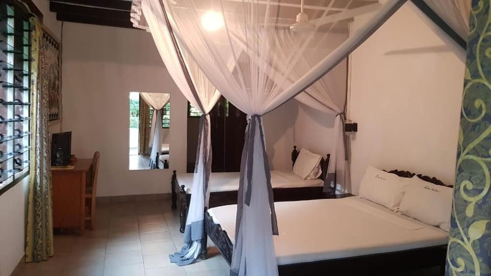 Desk, laptop workspace, free WiFi, bed sheets