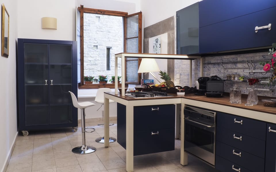 Classic Apartment | Minibar, in-room safe, iron/ironing board, free WiFi