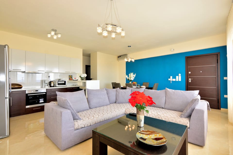 Apartment, 3 Bedrooms (Red) | Living room | Flat-screen TV, DVD player