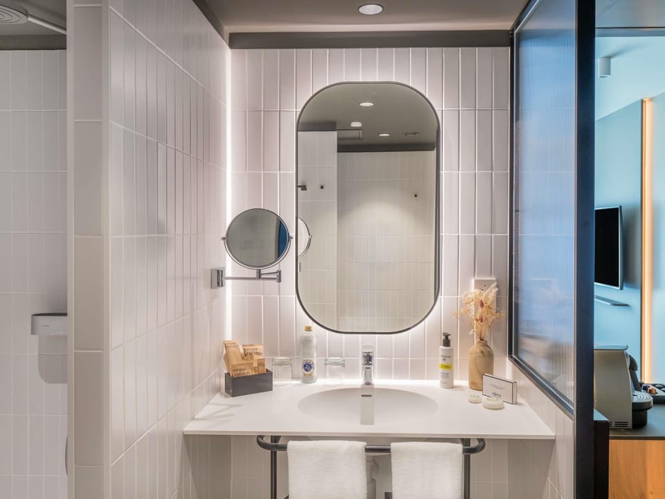 Eco-friendly toiletries, hair dryer, towels, soap