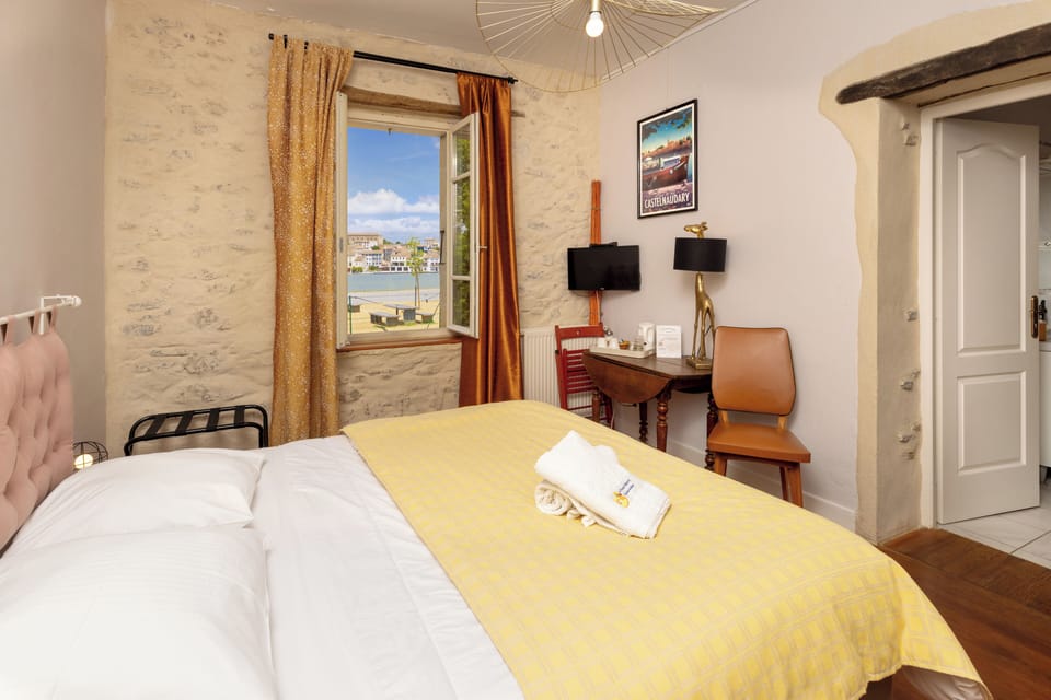 Room 2 : Safran, The Castelnaudary Grand Bassin View | Egyptian cotton sheets, premium bedding, individually decorated