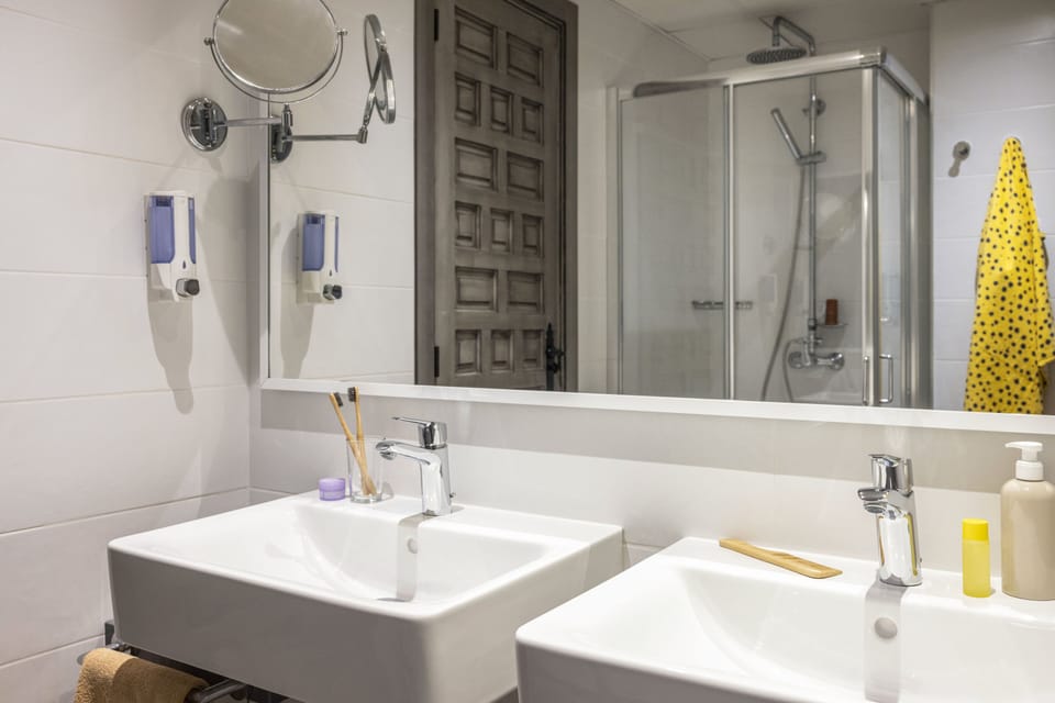 Family Room (Superior) | Bathroom | Shower, hair dryer, towels