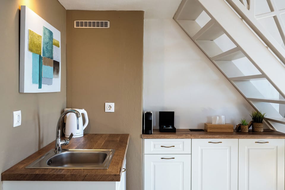 Apartment, Mezzanine | 2 bedrooms, in-room safe, soundproofing, iron/ironing board