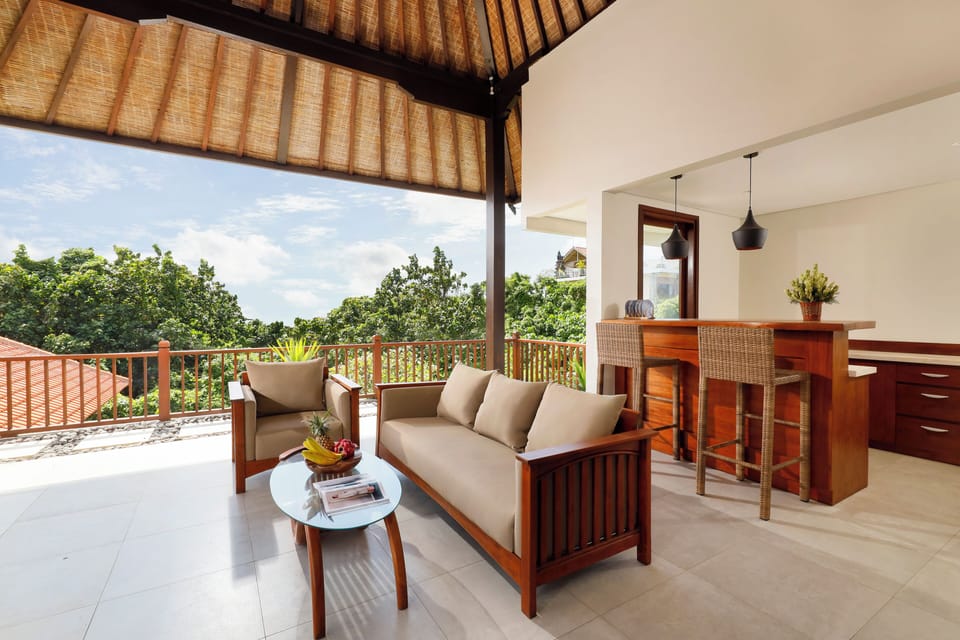 9 Bedroom Pool Villa | Living area | 50-inch Smart TV with digital channels, books