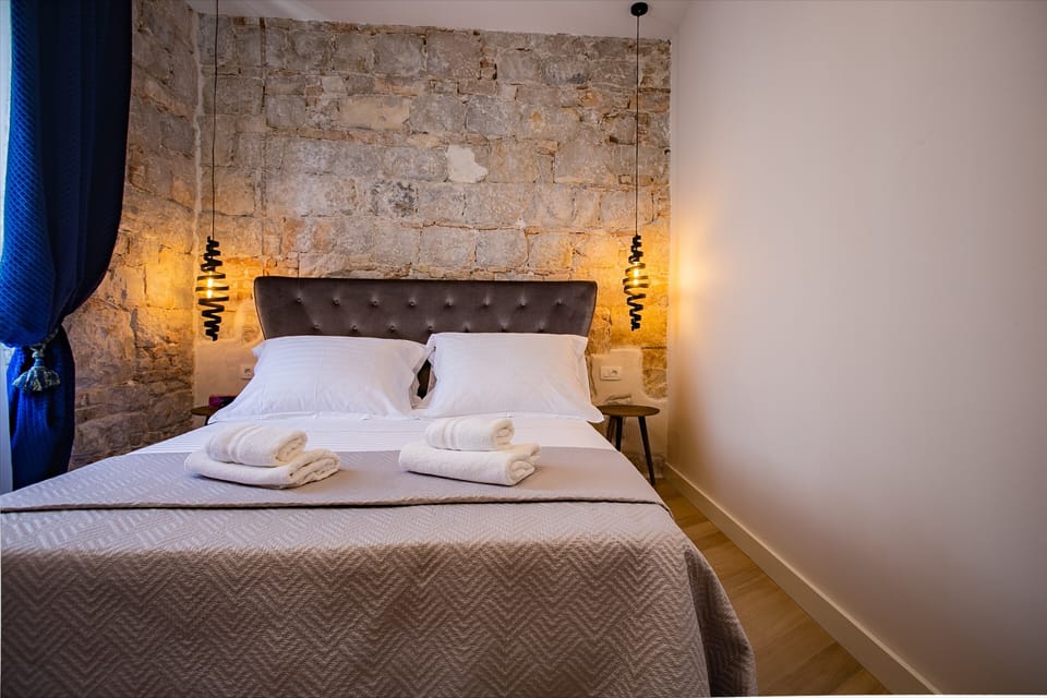 City Apartment, 1 Queen Bed | Minibar, in-room safe, individually decorated, individually furnished