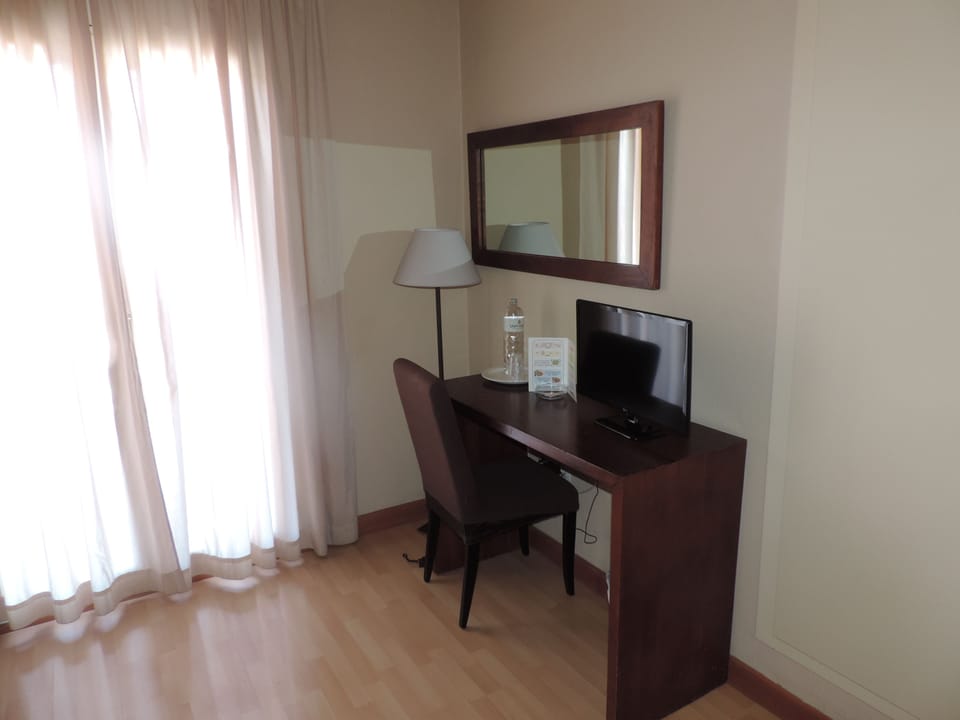 Desk, free WiFi, bed sheets