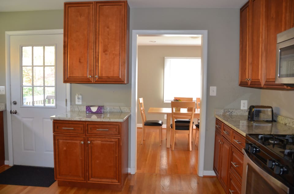Gourmet kitchen,  connected to dining room and deck