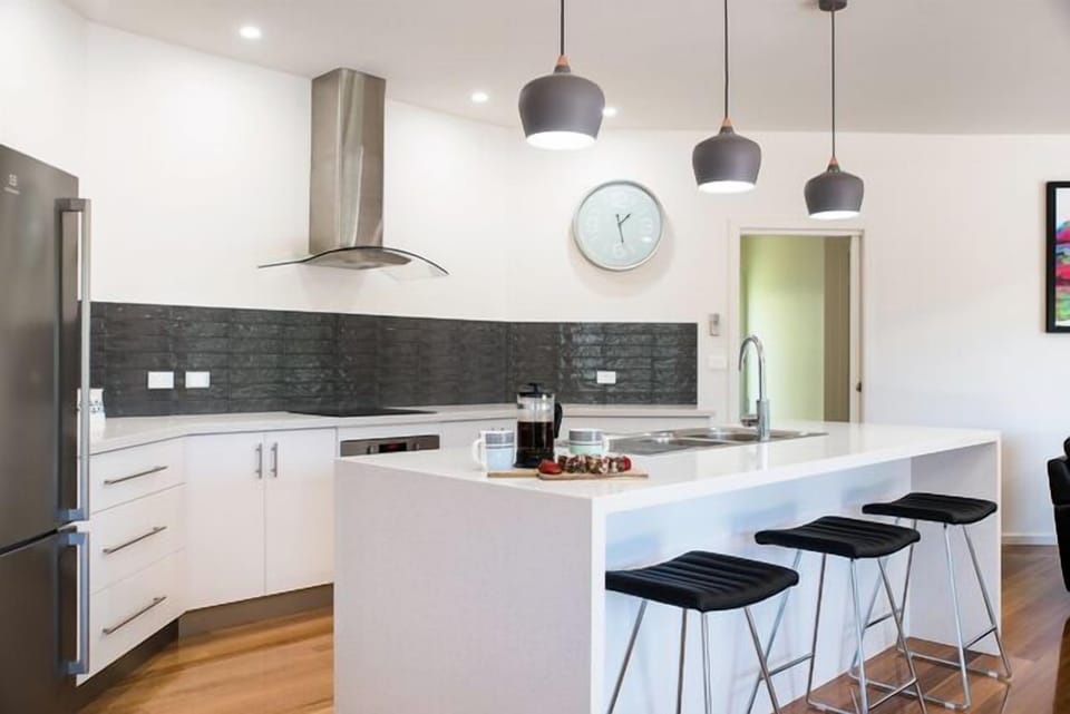 Kitchen with stone benches