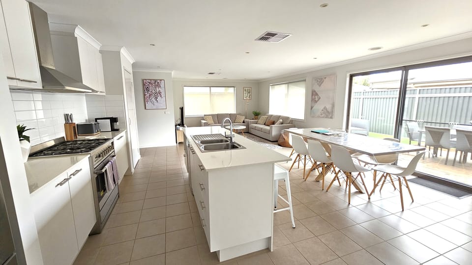 Well appointed kitchen, dining and second living area and 8 Seater dining table.