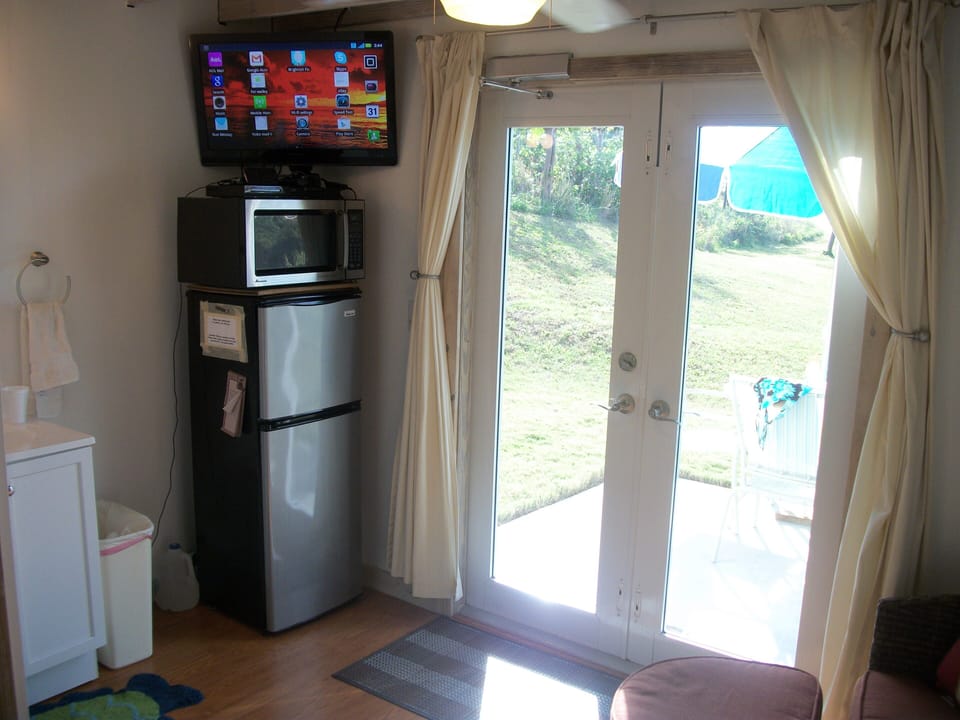 Dual opening doors, great natural light, view  the bay from inside.  