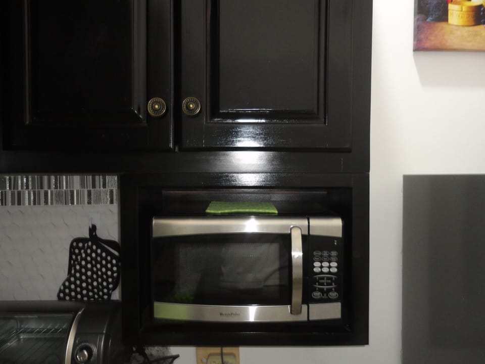 Modern amenities such as microwave, coffee maker, toaster oven, electric kettle 