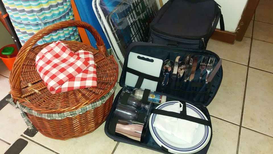 picnic sets, surf boards, beach towels, umbrellas and chairs