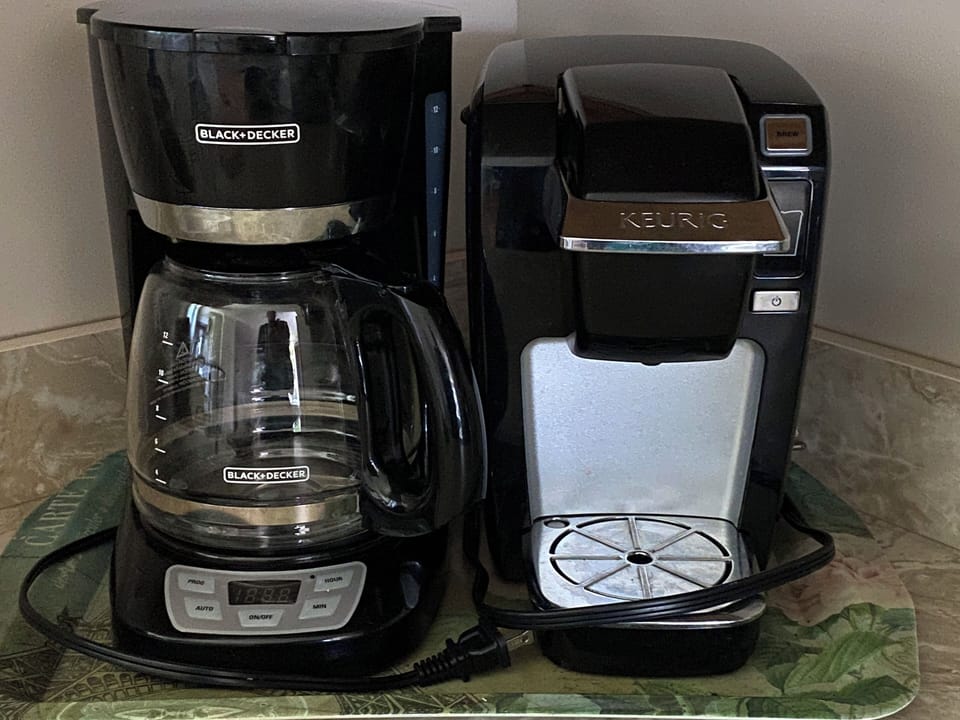 Drip coffee maker and Keurig with complimentary coffee & tea