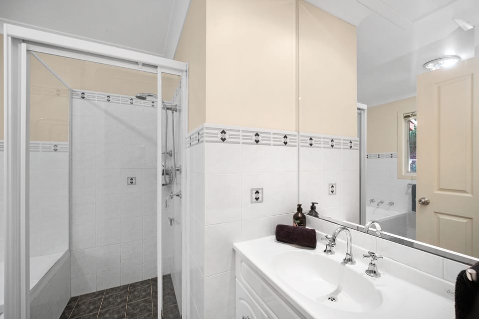 Full bathroom, with separated shower and bath