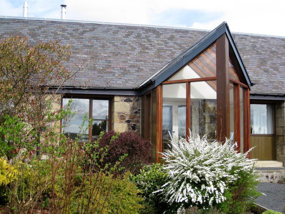 Begrum cottage has a south facing conservatory overlooking the cottage garden. 