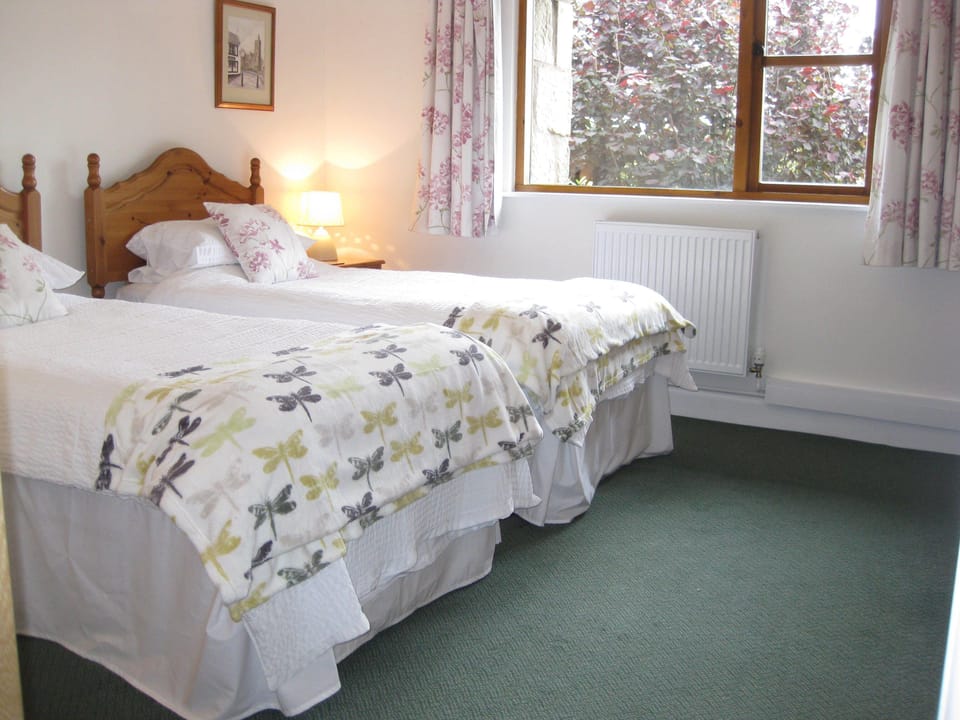 Begrum cottage has twin beds which can be arranged as a 6 ft double.
