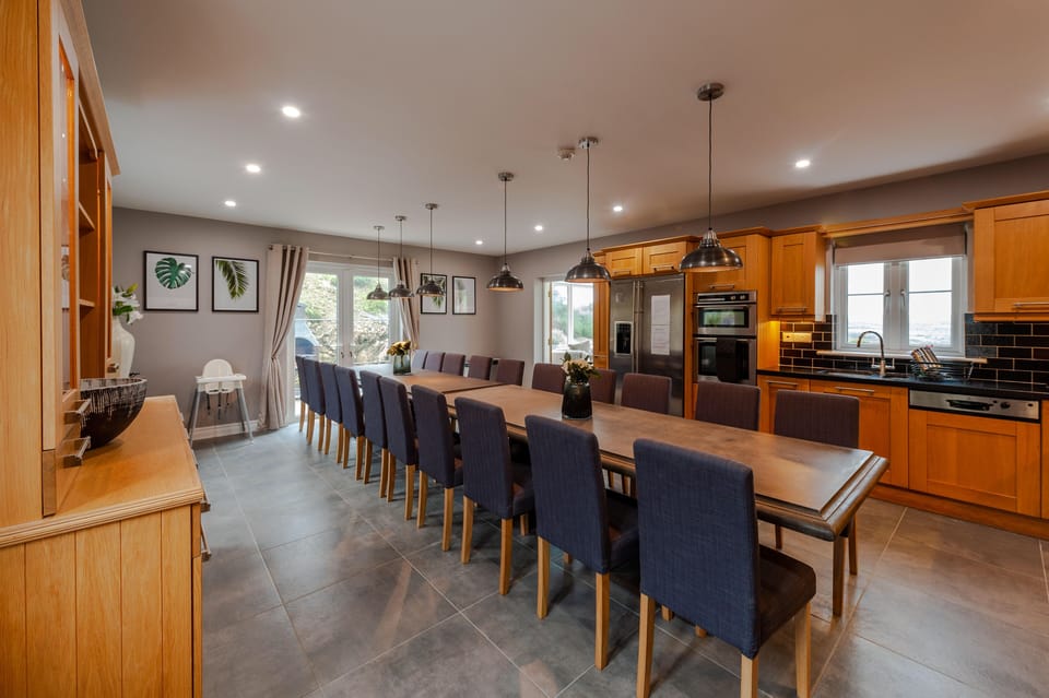 Kitchen table seats 20 guests
