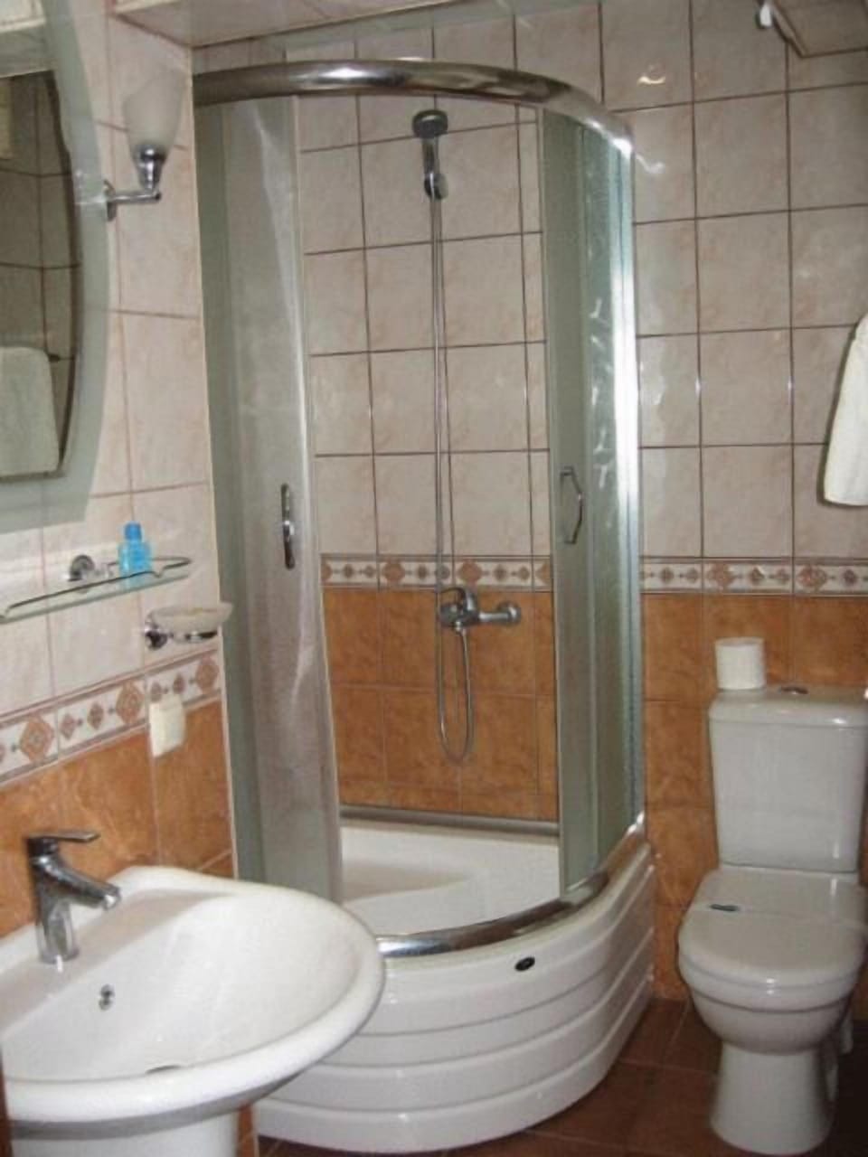 Shower, free toiletries, hair dryer, slippers