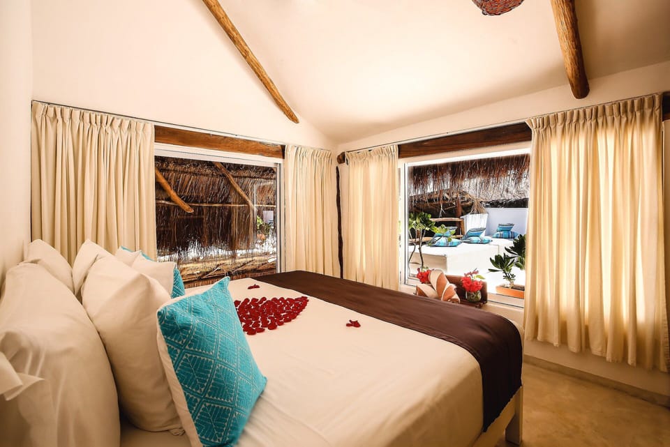 Vanilla Loft | Minibar, in-room safe, blackout drapes, free wired internet