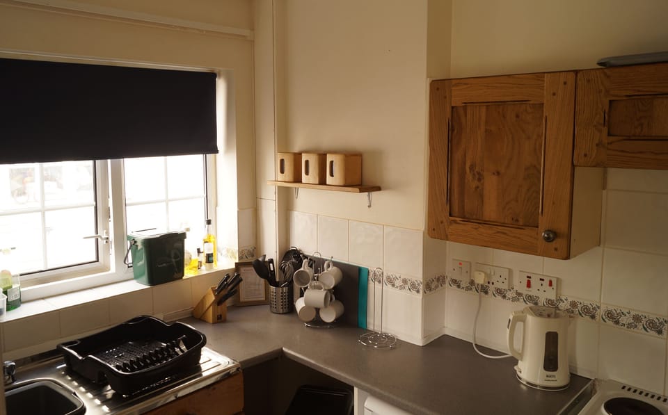 Kitchen, with fridge, cooker, kettle & toaster