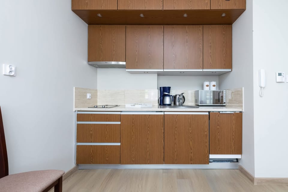 A functional kitchenette allows you to prepare home-cooked meals.