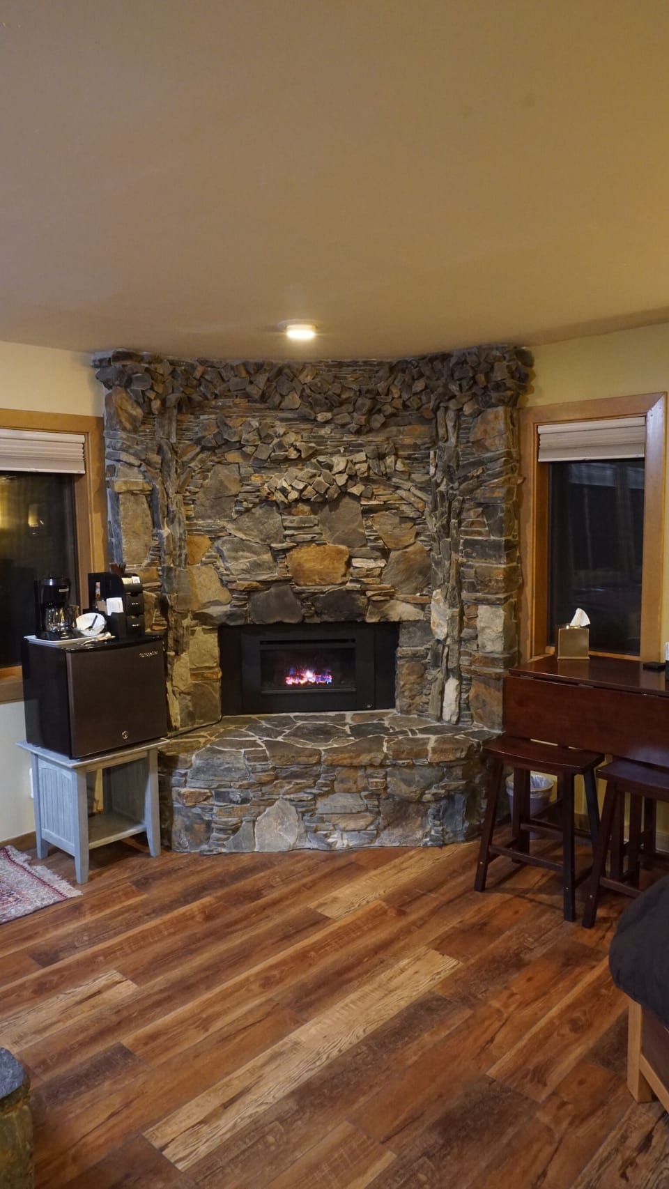 Romantic and cozy gas fireplace inside the room.