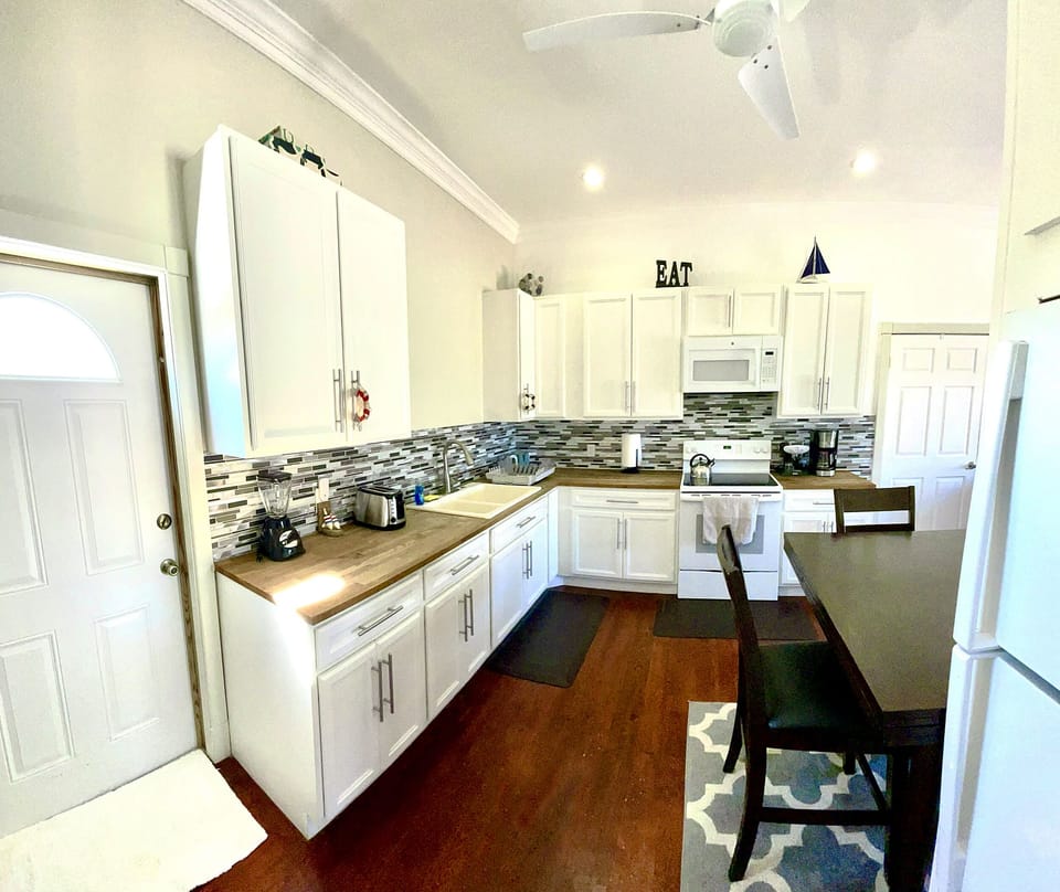 High end kitchen with Ikea cabinets. Coffee maker, Expresso and Capuccino maker.