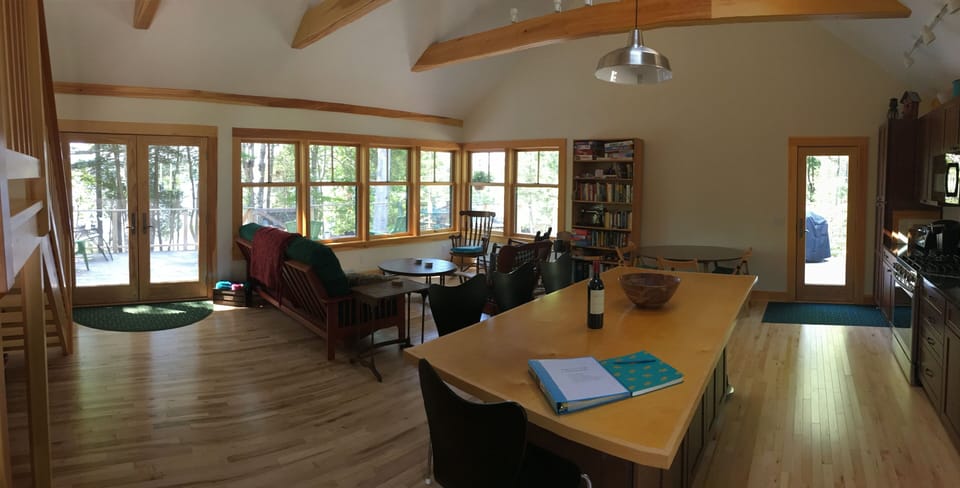 Great room with living, dining, and kitchen areas.